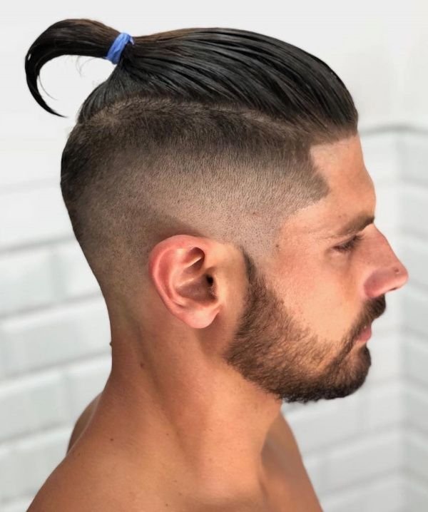 Low Fade Slit Shave With A Pony